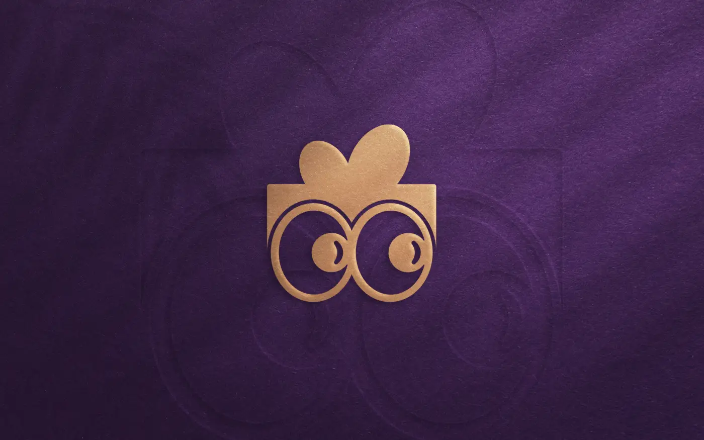 Geefty Logo-Design, geprägte Goldfolie auf violettem Material