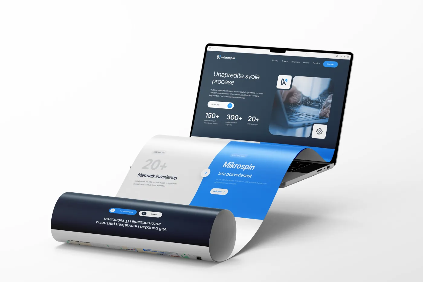Mikrospin Website auf einem Laptop-Bildschirm mit gerolltem Druckposter davor